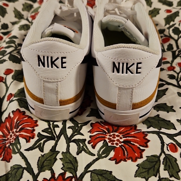 Nike White Sneakers with Black Swoosh and Gold Trim - Picture 2 of 4